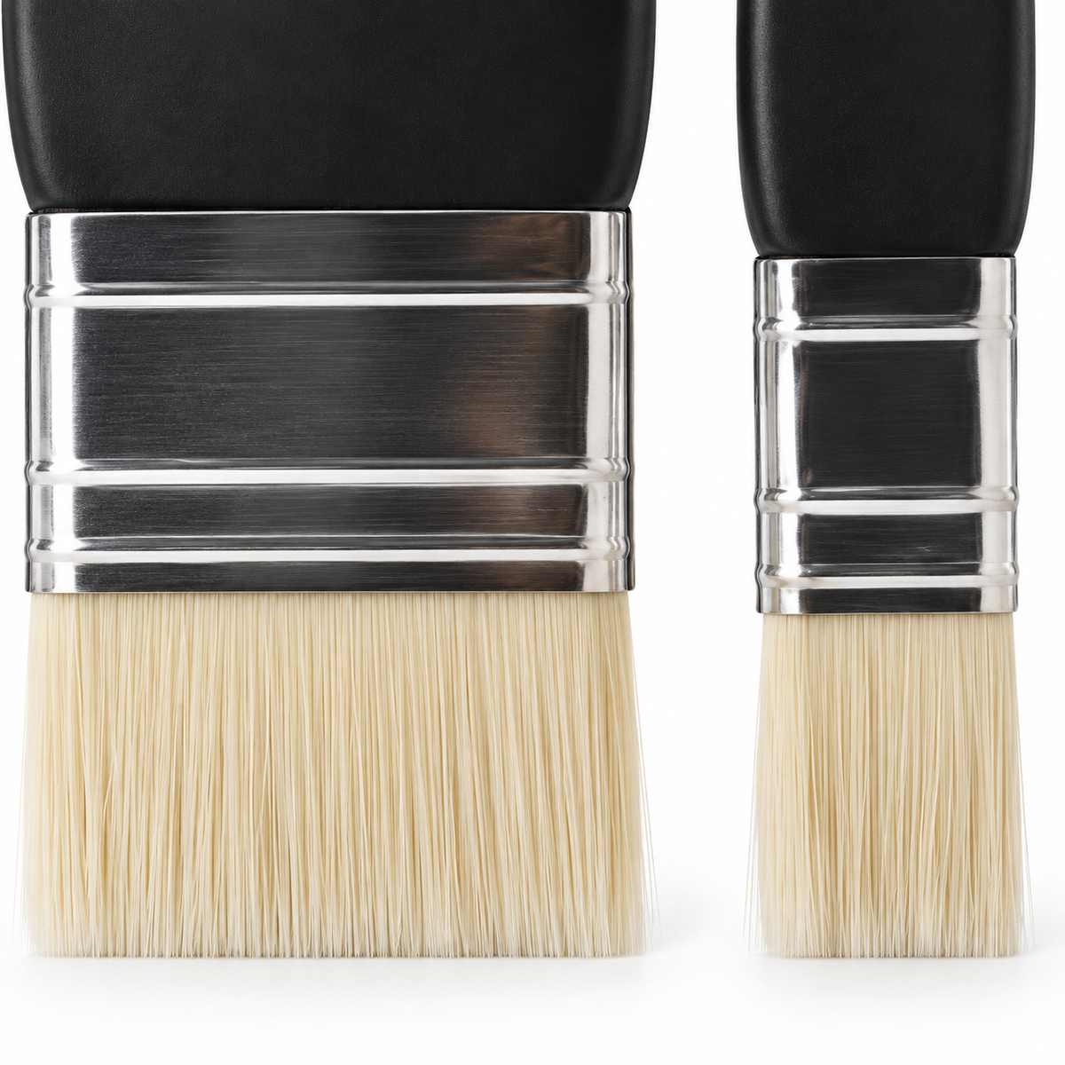 Close-up of flat brushes’ synthetic bristles and metal ferrules