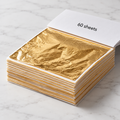 Book of 60 imitation gold leaf sheets separated by tissue