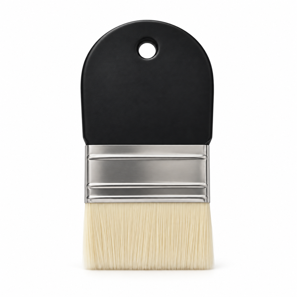 Wide flat brush with short black handle and cream synthetic bristles