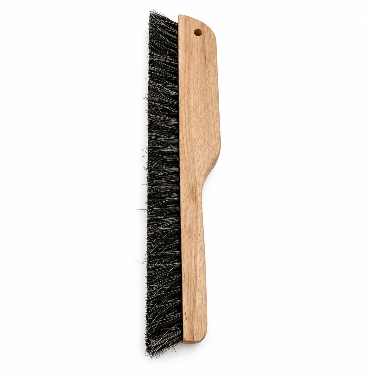 Straight-on profile of wooden plaster texturing brush